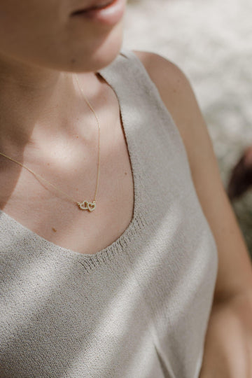 Χρυσό κολιέ Κ14 καρδιές με πέτρες